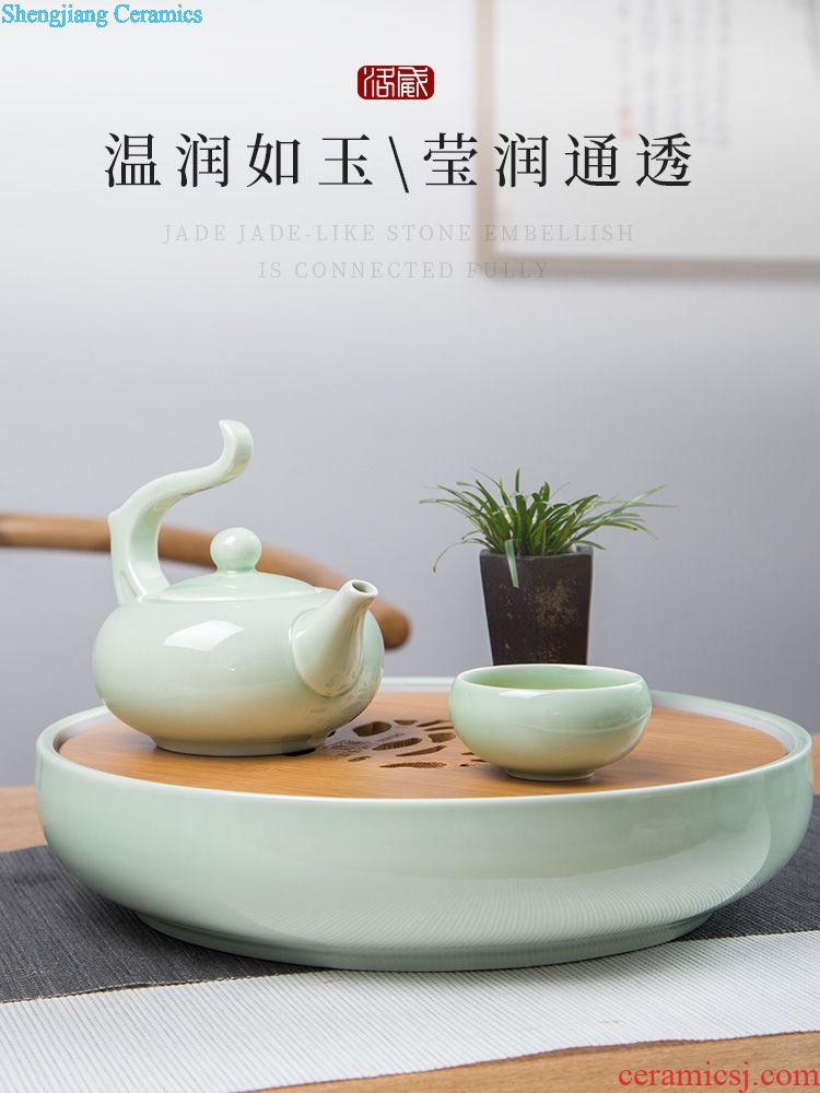 Yellow jingdezhen tea set suit household kung fu tea cups large circular double teapot tea tray of a complete set of ceramics