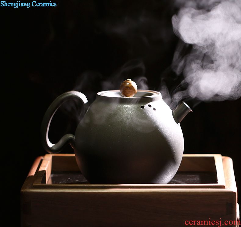 The three frequently kung fu tea set Contracted the teapot hand grasp pot of whole household your kiln ceramic small tea cups