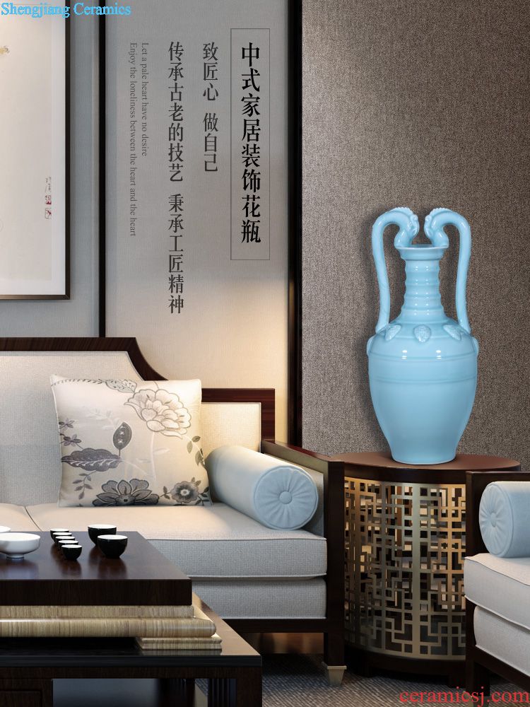 Jingdezhen ceramic vase furnishing articles imitation qing qianlong pastel blue tie up grilled branch lotus flower plum bottle of home decoration