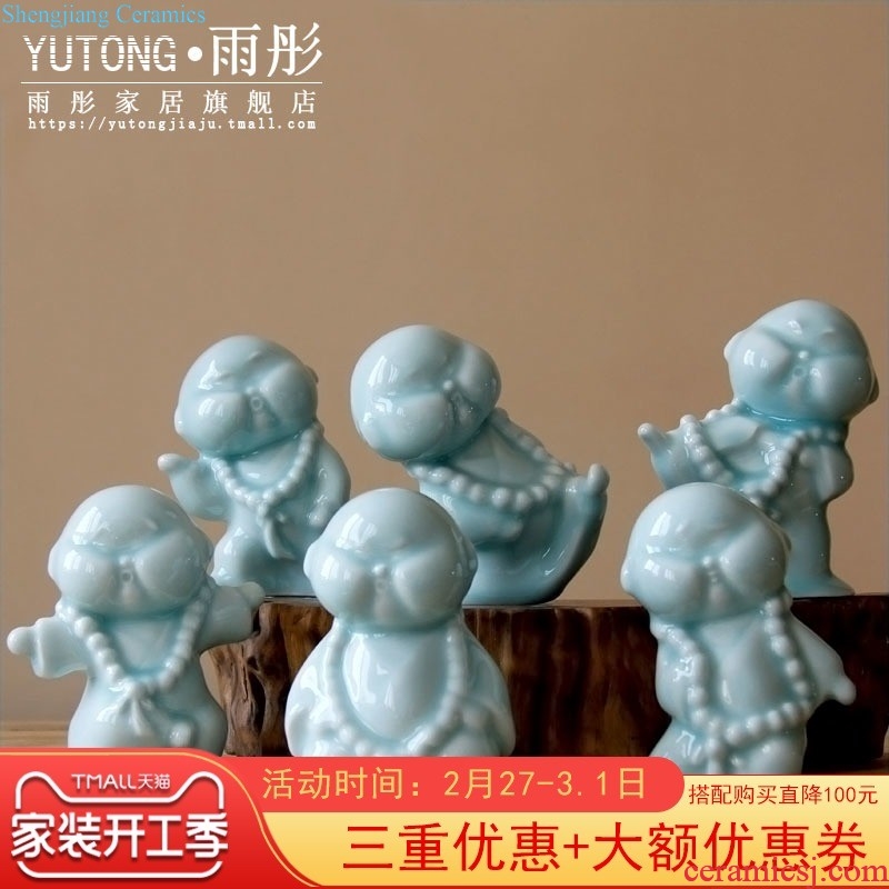 Rain tong home | jingdezhen ceramics creative home hand shadow celadon kung fu boy little monk ceramic furnishing articles