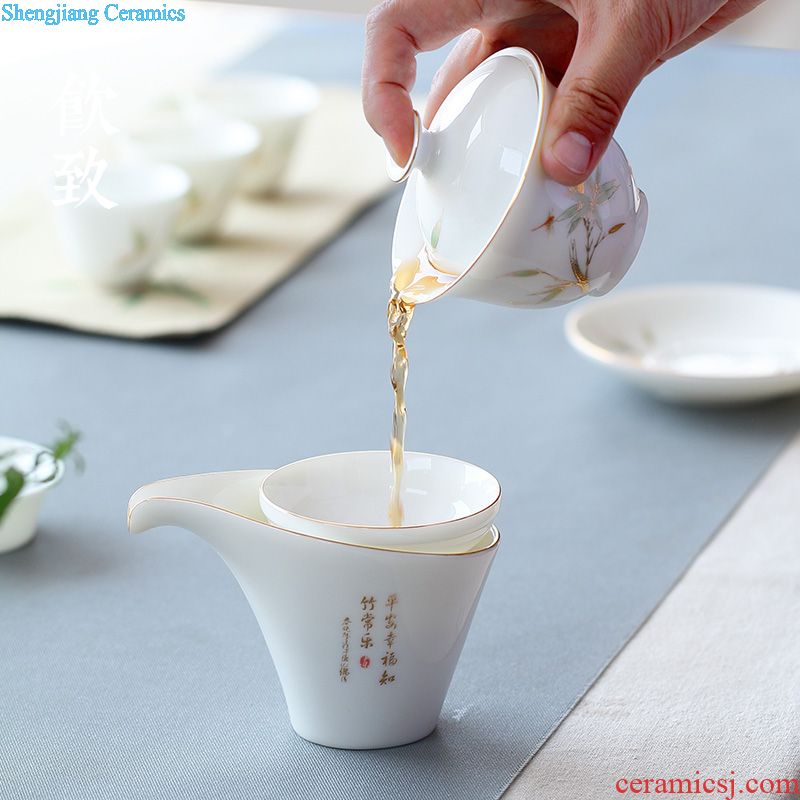 Drink to the colour of a complete set of dehua white porcelain tea set set of household kung fu tea tureen of pottery and porcelain teacup gift set
