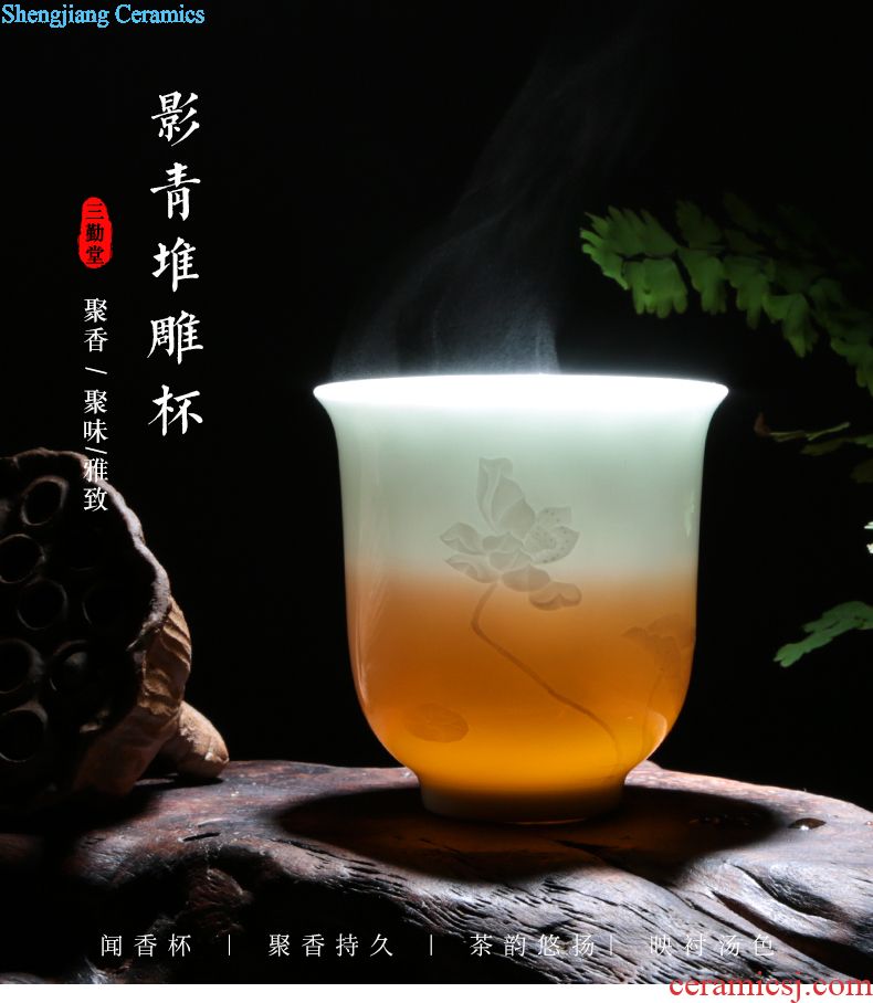 曾庆华-影青堆雕-茶杯_01.jpg