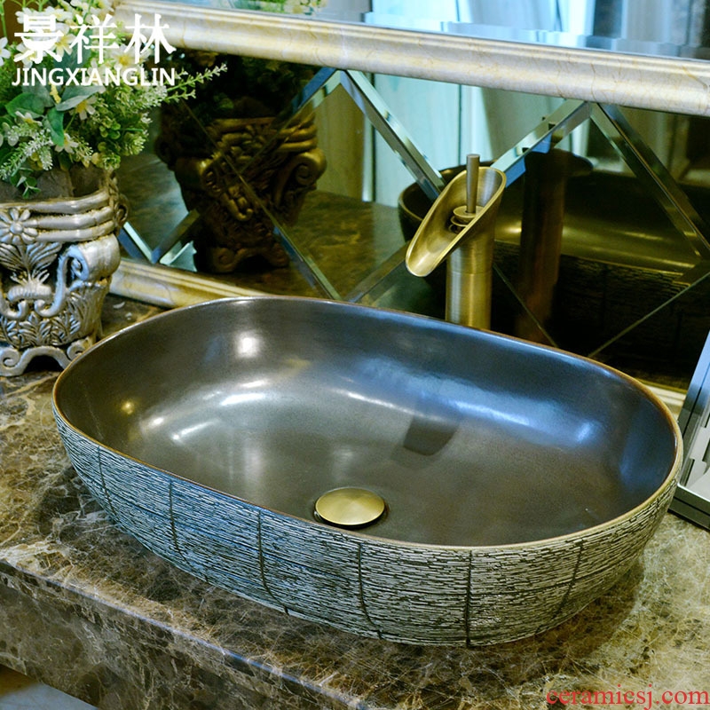 Jingdezhen stage basin ceramic lavabo archaize carving process elliptic basin of Chinese style bathroom art basin