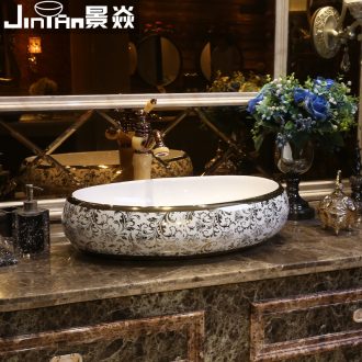 JingYan European art of titanium coating on the stage basin oval ceramic lavatory household basin on the sink basin