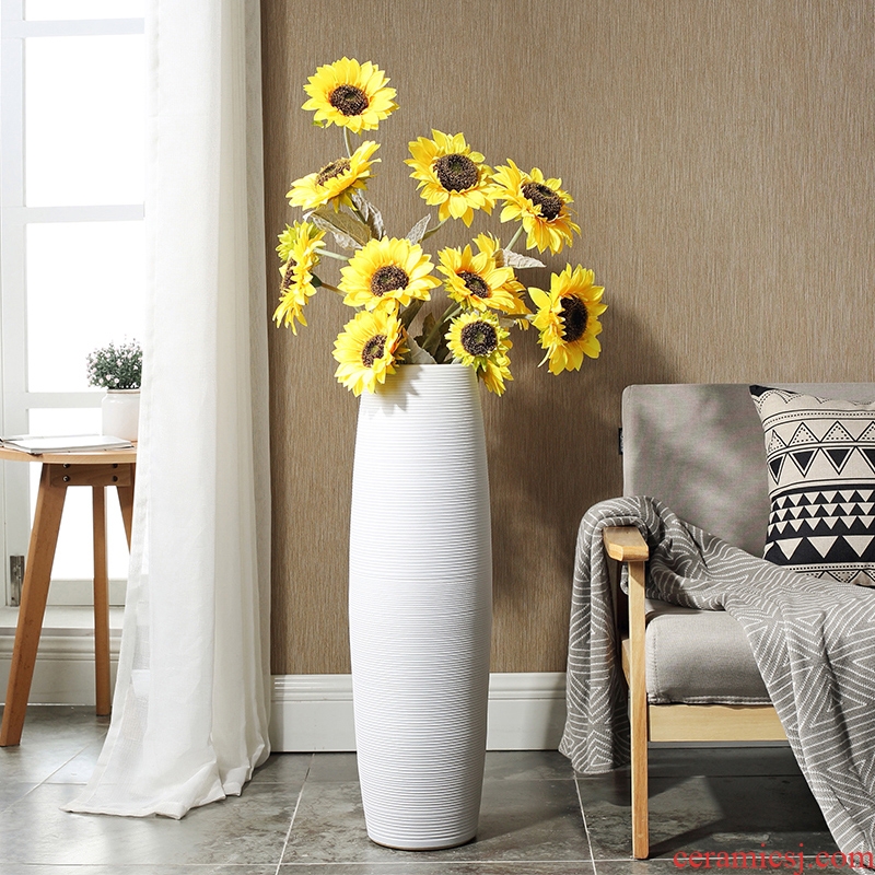Contemporary and contracted ceramic floor high furnishing articles bouquets of the sitting room porch household adornment gets a hydroponic long white vase