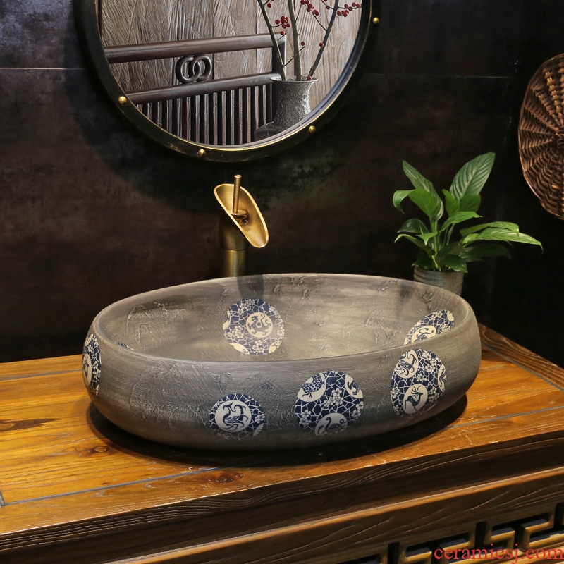 JingYan blue and white porcelain art stage basin oval ceramic lavatory new Chinese style restoring ancient ways of archaize on the sink