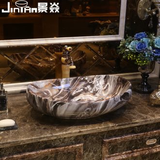 JingYan marble art stage basin oval sink basin ceramic lavatory Europe type on the sink