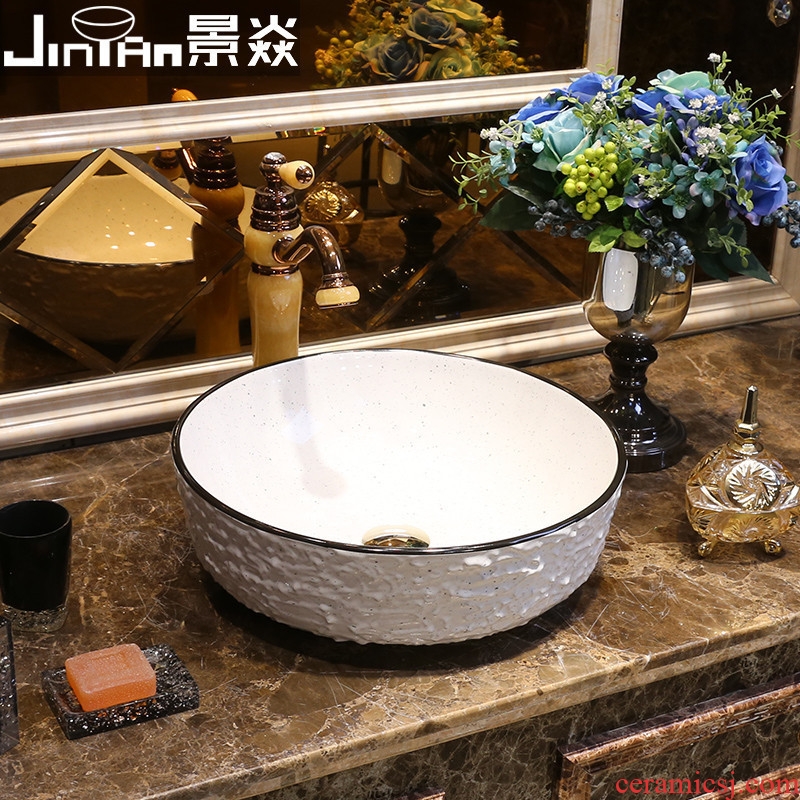 JingYan Bai Seyao stone art stage basin round ceramic lavatory household toilet stage basin on the sink