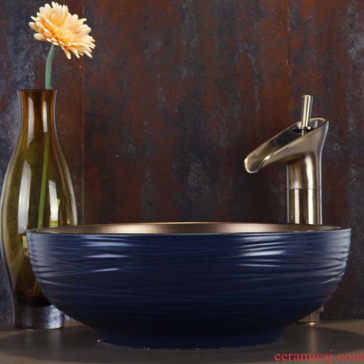 JingYan Nordic art stage basin contracted wind restoring ancient ways round ceramic lavatory color archaize on the sink