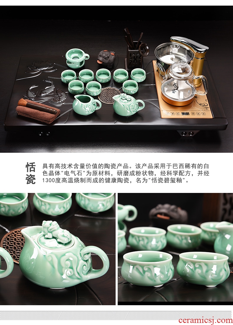 The cabinet sheet of the ebony wood tea tray home tea purple ceramic tea set automatic four and tea ceremony