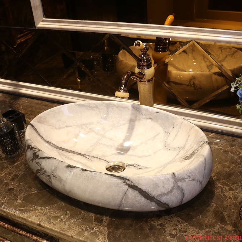 JingYan marble art stage basin ceramic lavatory oval basin American basin on the sink