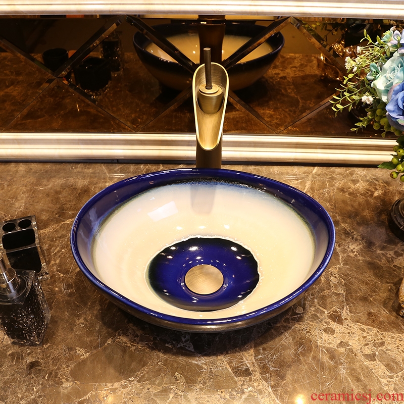 JingYan blue and white boat art stage basin to creative ceramic sinks oval face basin on the sink