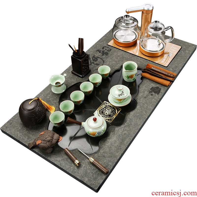 The cabinet sharply stone tea tray ceramic tea set a complete set of kung fu household automatic induction cooker tea tea ceremony