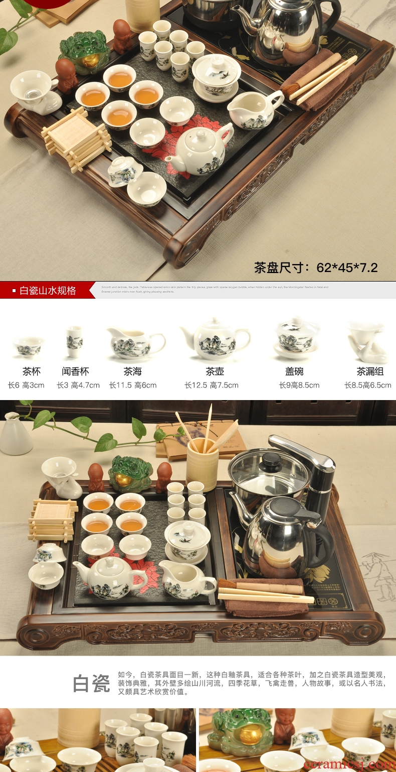 The cabinet of household ceramic teapot teacup kung fu tea set solid wood tea tray four unity tea tea set electric heating furnace