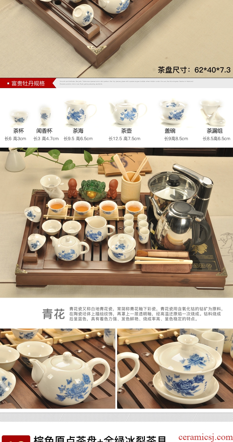 The cabinet of household ceramic teapot teacup kung fu tea set solid wood tea tray four unity tea tea set electric heating furnace
