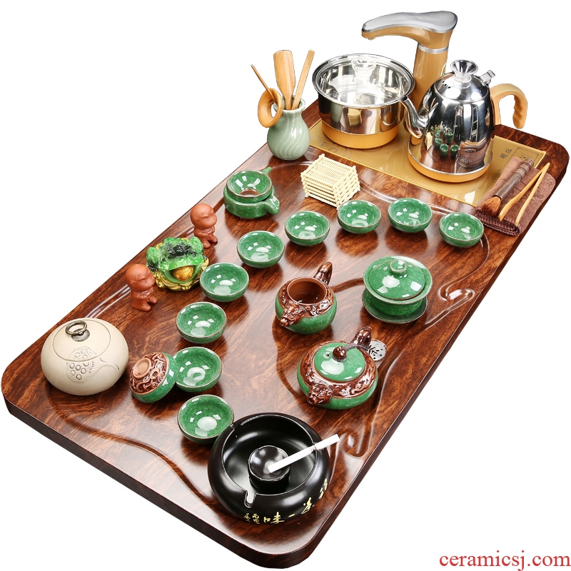 Gorgeous young ceramic kung fu tea set household contracted magnetic electric furnace tea cups tea complete set of solid wood tea tray