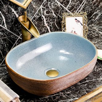 Ceramic sink on stage basin oval plate of the pool that wash a face Chinese creative household toilet bathroom art