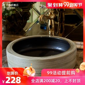 Jingdezhen ceramic toilet stage basin rain spring art stage basin lavatory basin sink and white circle on the stage