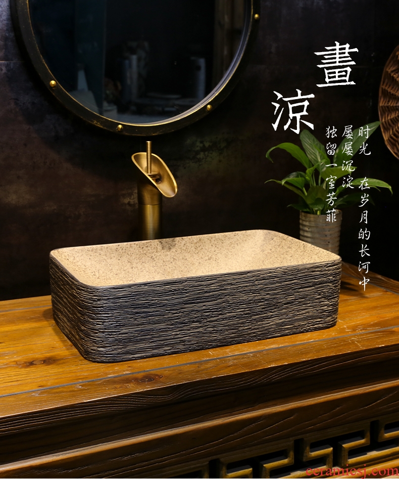 Archaize manual scrub the bathroom on bonsai DE mayor rectangular art basin of black wood grain ceramic wash basin