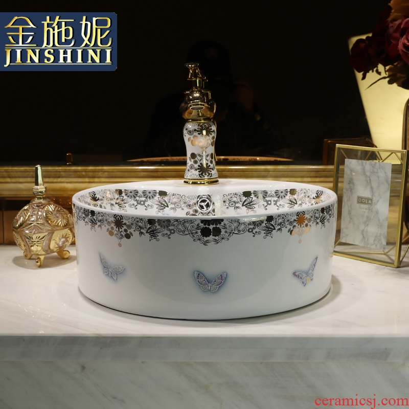 The stage basin ceramic washing basin creative Nordic modern Chinese circular home wash gargle art basin