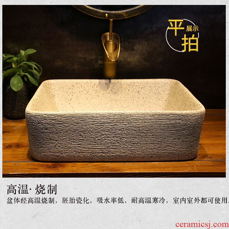 Archaize grind arenaceous grain art stage basin rectangle ceramic lavatory basin of Chinese style household on the sink