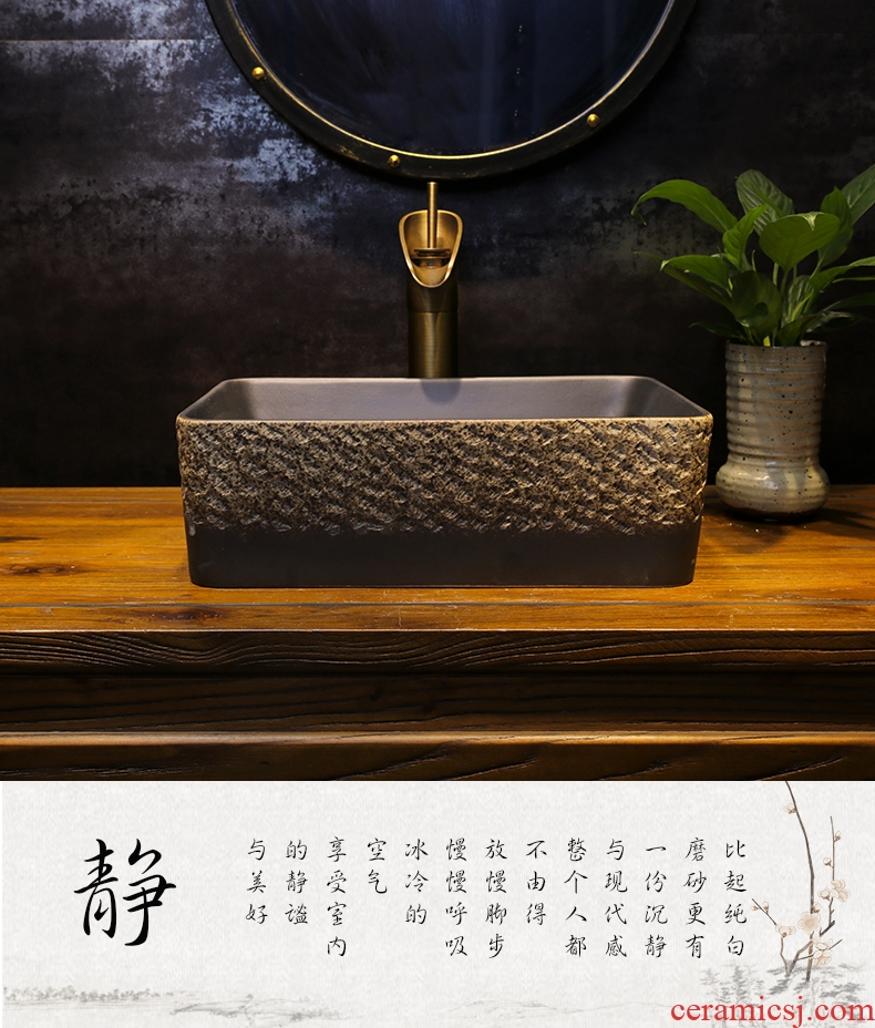 The stage basin to black stone carving art ceramic rectangle retro sinks the trumpet on the sink