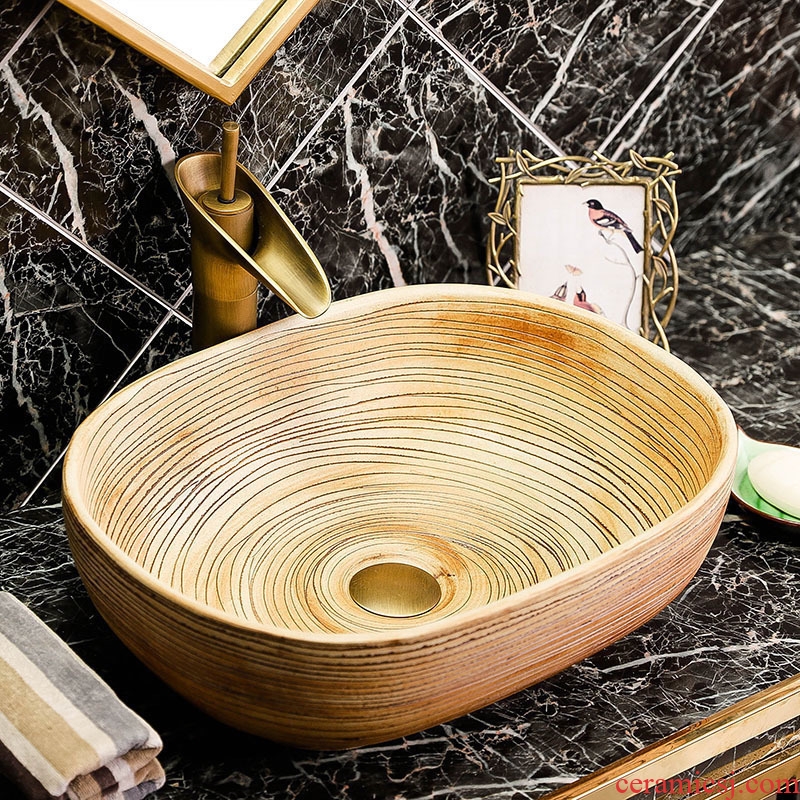 The stage basin oval ceramic lavatory wiredrawing basin of Chinese style antique art creative home toilet lavabo