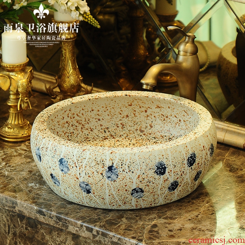 Jingdezhen ceramic art rain spring on the stage basin round basin carved antique basin bathroom sink in the kitchen