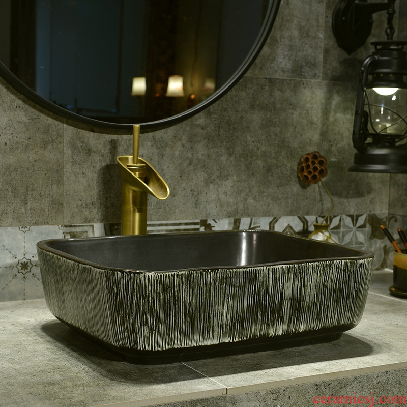 Jingdezhen basin of Chinese style lavatory washbasins kaolin ceramic on the stage of the basin that wash a face basin of rectangular black wood