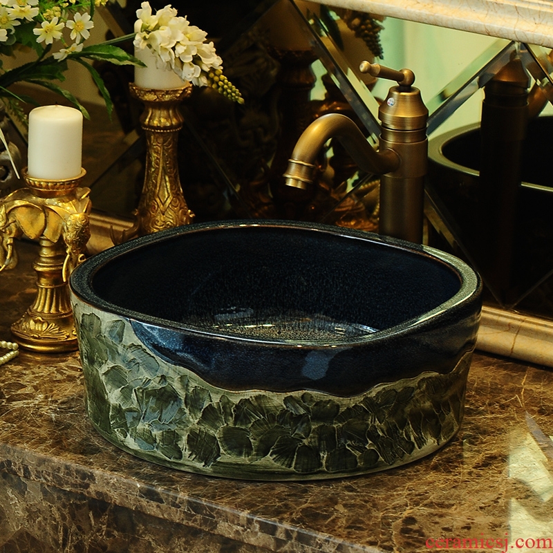 Jingdezhen ceramic art stage basin circular hand-carved basin that wash a face with thick Europe type restoring ancient ways the bathroom sinks