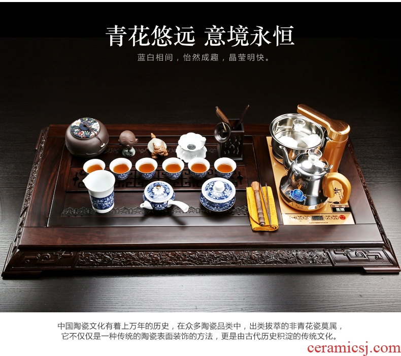 Qin Yi household contracted ebony wood tea tray tea sets of purple sand pottery and porcelain of a complete set of kung fu tea set magnetic electric heating furnace