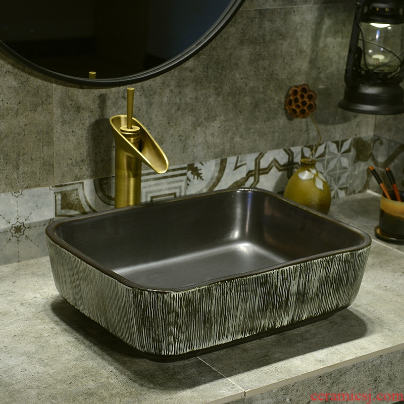 Jingdezhen basin of Chinese style lavatory washbasins kaolin ceramic on the stage of the basin that wash a face basin of rectangular black wood