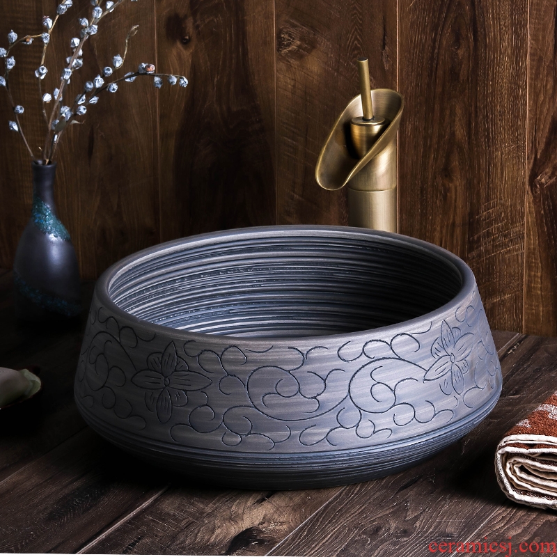 Jingdezhen ceramic lavabo is the pool that wash a face new round carving Chinese style hotel bathroom toilet art basin