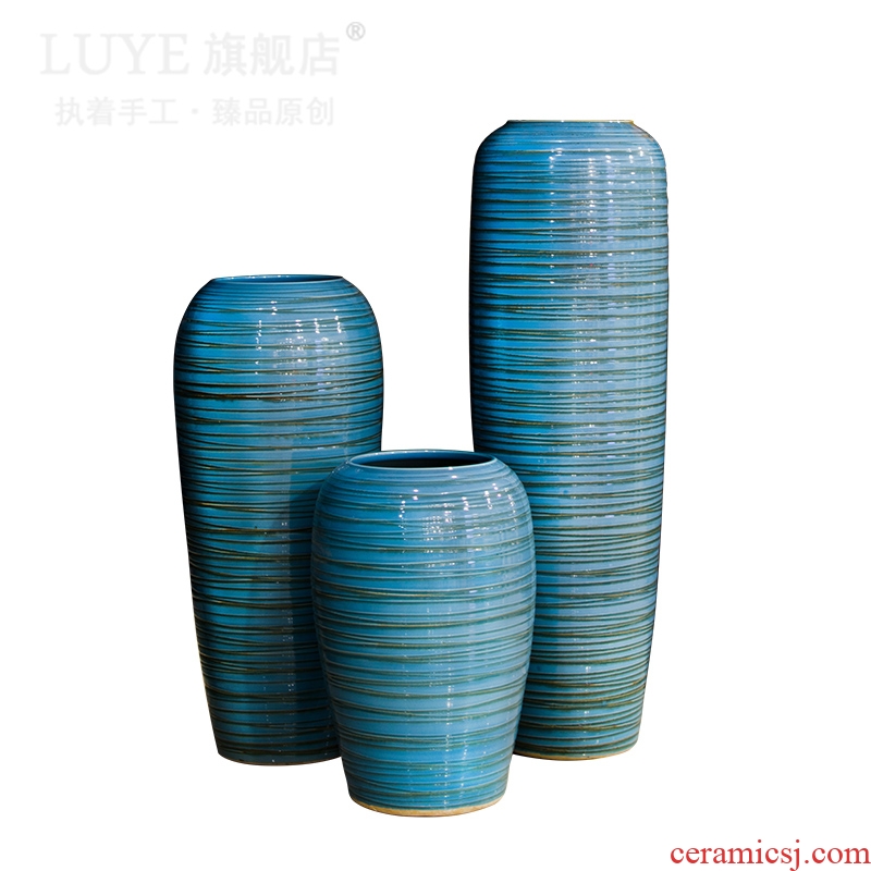 Big blue vase landed sitting room lobby flower arranging place large household adornment to heavy clay ceramic vase