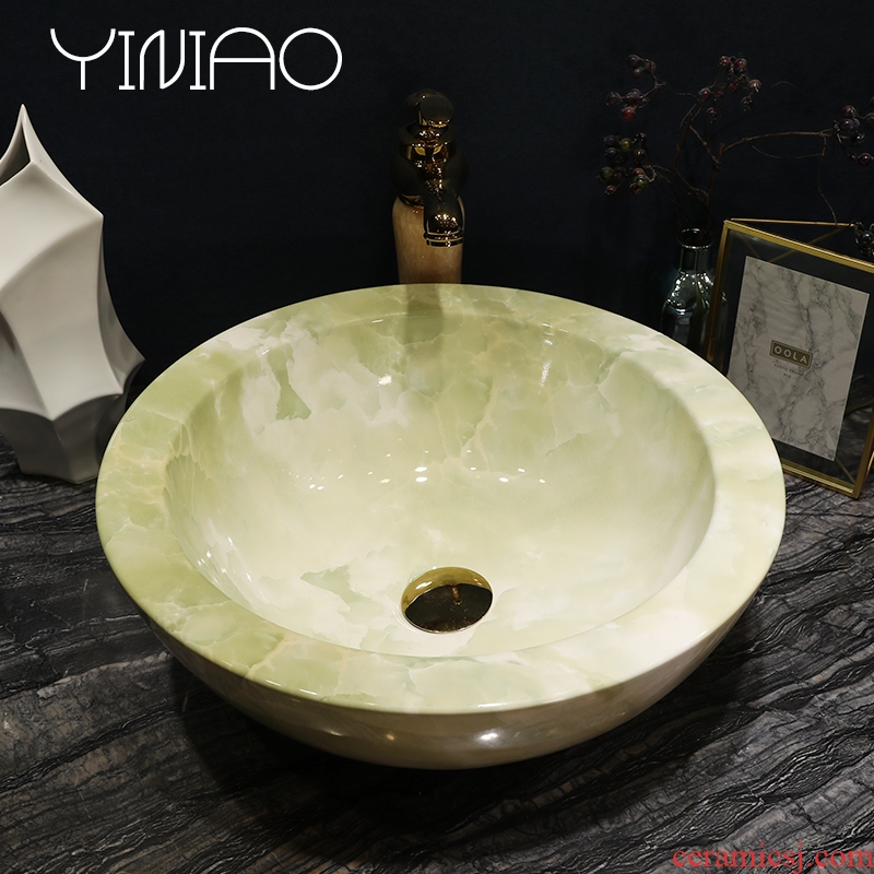 Million birds ceramic art basin stage basin sink European toilet lavatory basin of green marble table