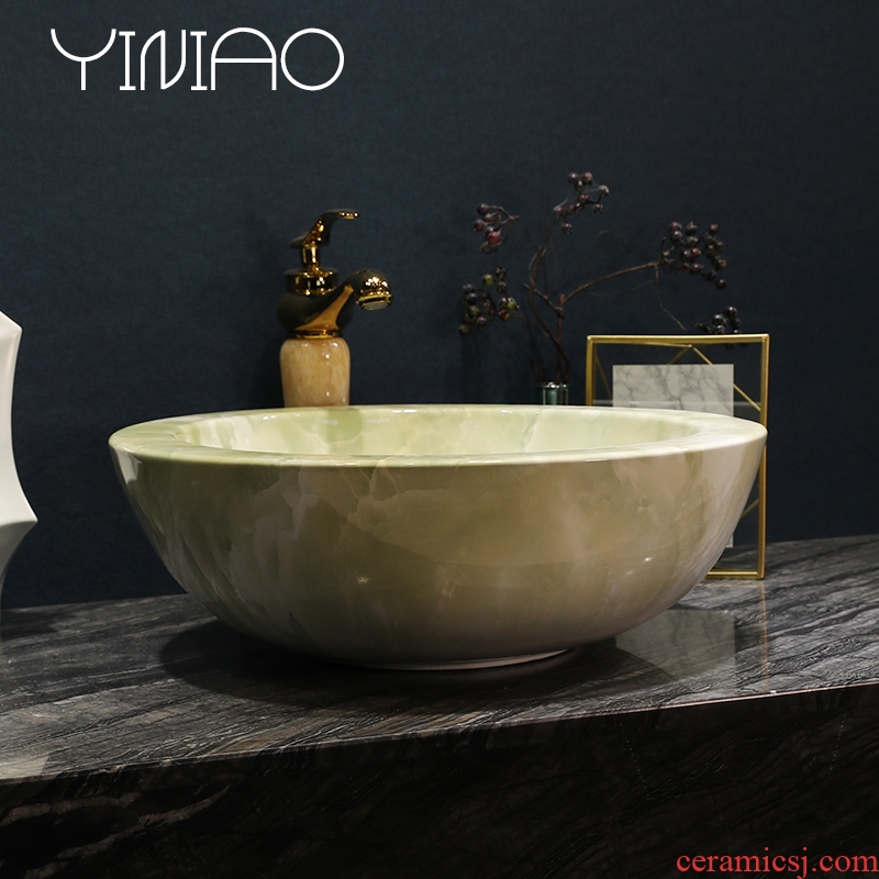 Million birds ceramic art basin stage basin sink European toilet lavatory basin of green marble table