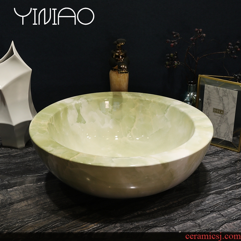 Million birds ceramic art basin stage basin sink European toilet lavatory basin of green marble table