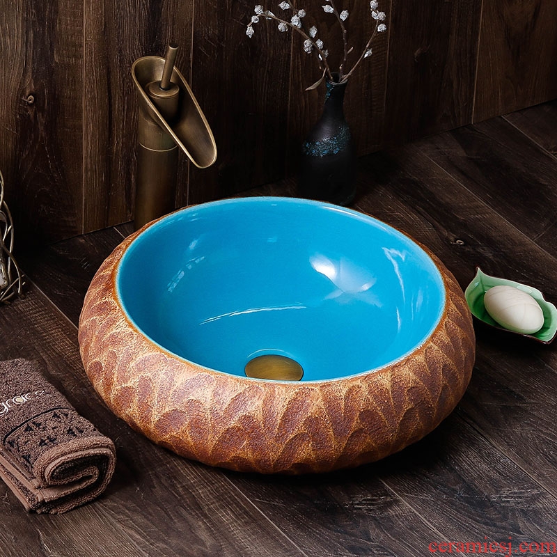 On the sink of jingdezhen ceramic art round Chinese small household hotel toilet wash basin