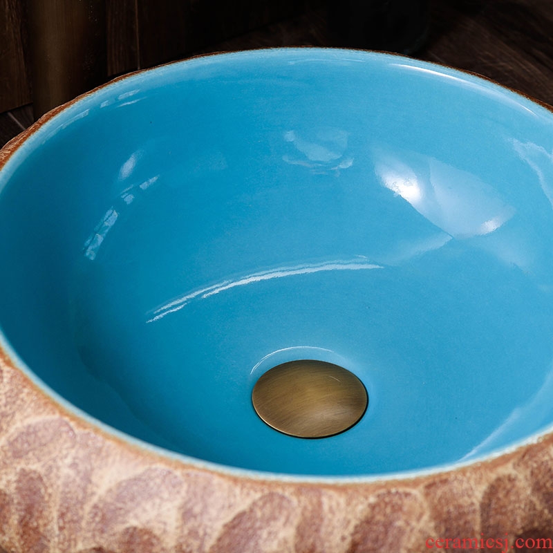 On the sink of jingdezhen ceramic art round Chinese small household hotel toilet wash basin