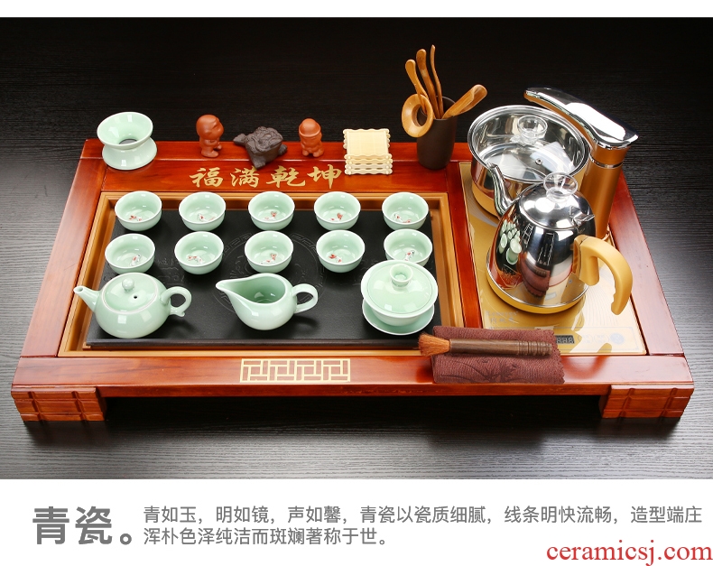 A complete set of automatic purple sand tea set household ceramics kung fu tea tray is contracted solid wood tea tea is the tea ceremony
