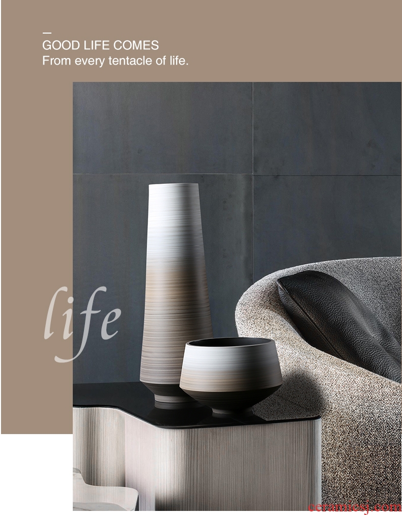 Designer duds ceramic vase is placed between example soft adornment creative dry flower vase porcelain light luxury living room