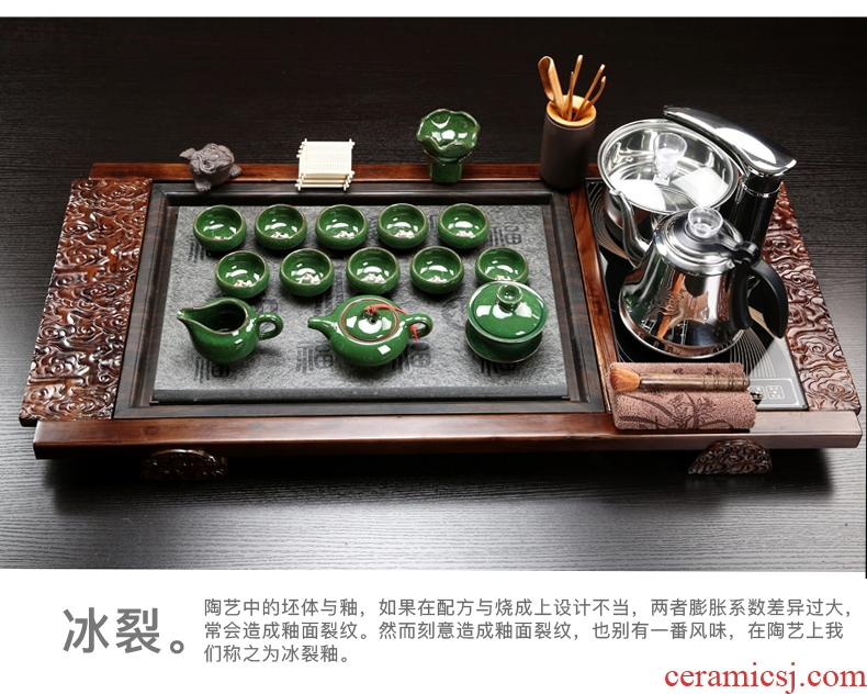 A complete set of automatic purple sand tea set household ceramics kung fu tea tray is contracted solid wood tea tea is the tea ceremony