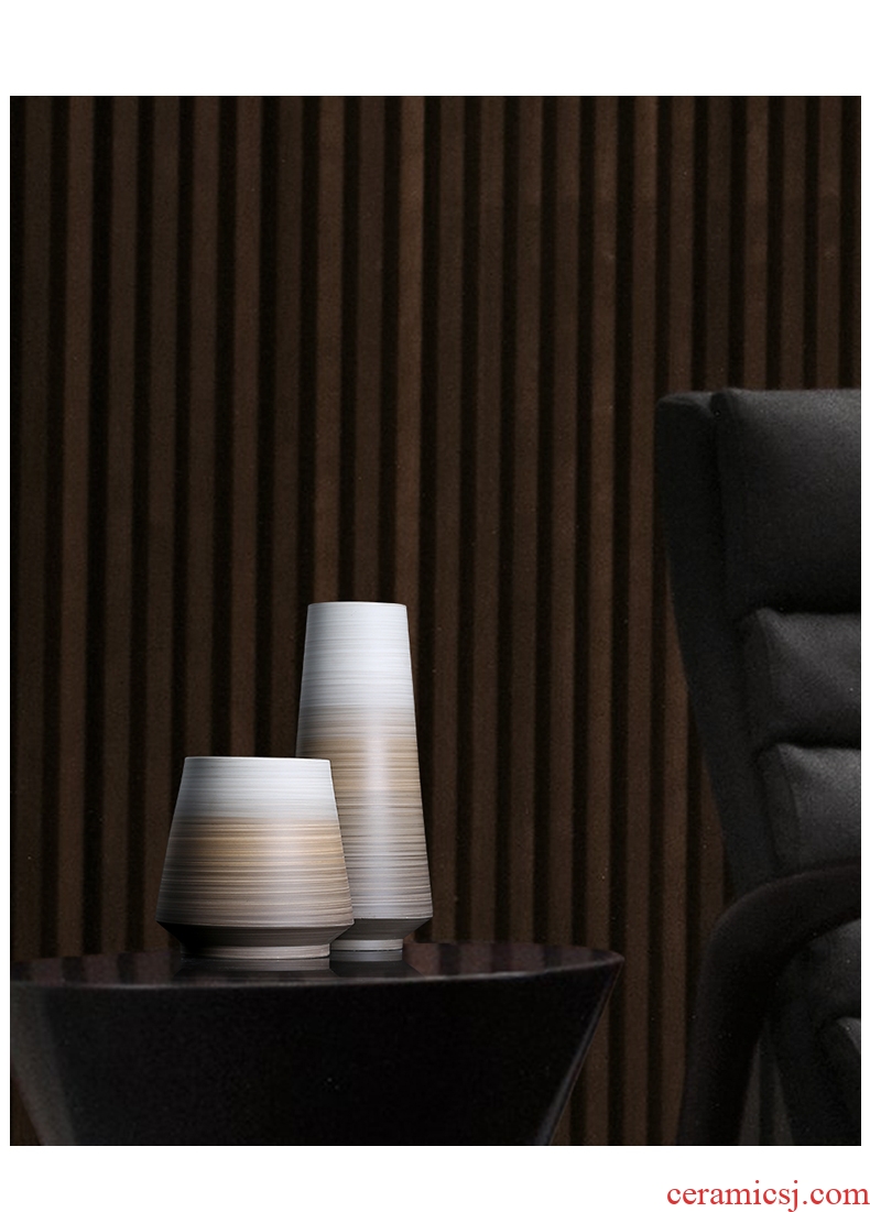 Designer duds ceramic vase is placed between example soft adornment creative dry flower vase porcelain light luxury living room