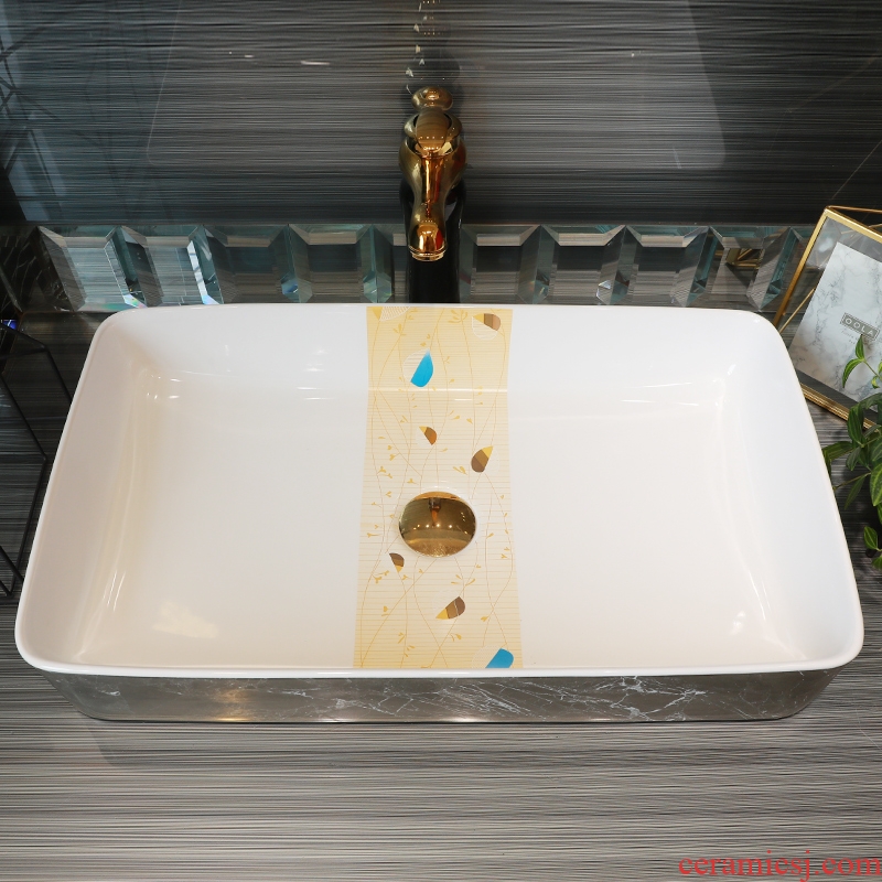 Contracted on the ceramic bowl lavatory square black marble basin of household toilet lavabo art