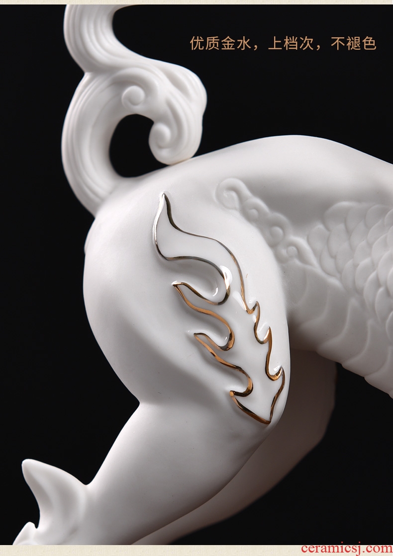 Oriental colour kirin furnishing articles dehua white porcelain clay ceramic sculpture art manual process/kirin in delight