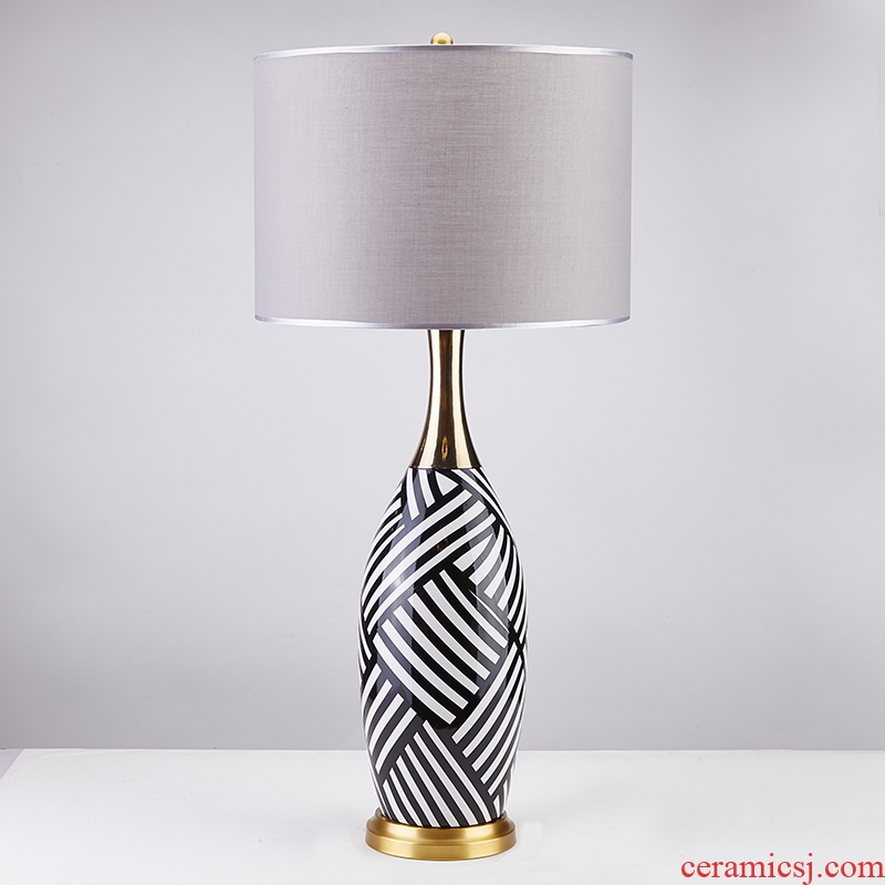 The Desk lamp of bedroom the head of a bed room American postmodern Nordic light key-2 luxury ins all copper model between ceramic lamp, black and white stripes