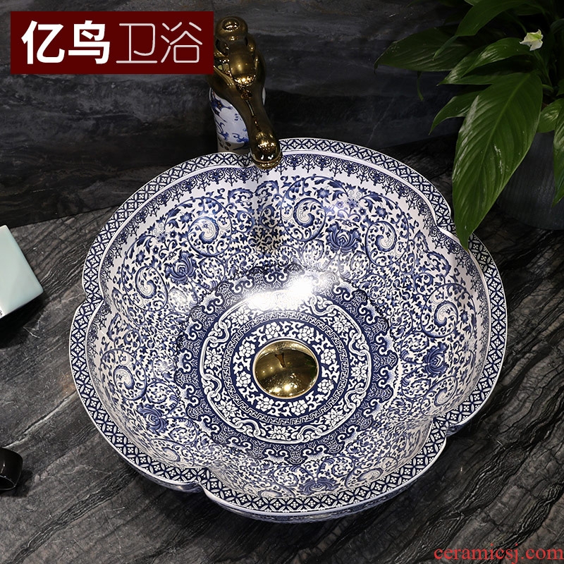 Million birds on the blue and white porcelain basin jingdezhen ceramic lavatory basin of Chinese style art basin petals round the sink