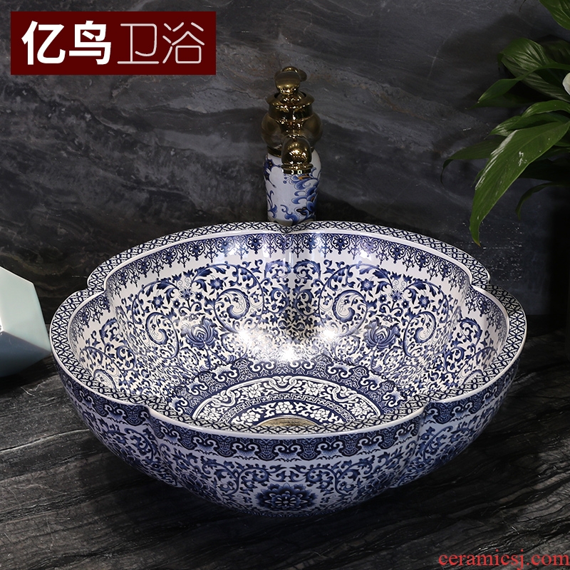 Million birds on the blue and white porcelain basin jingdezhen ceramic lavatory basin of Chinese style art basin petals round the sink