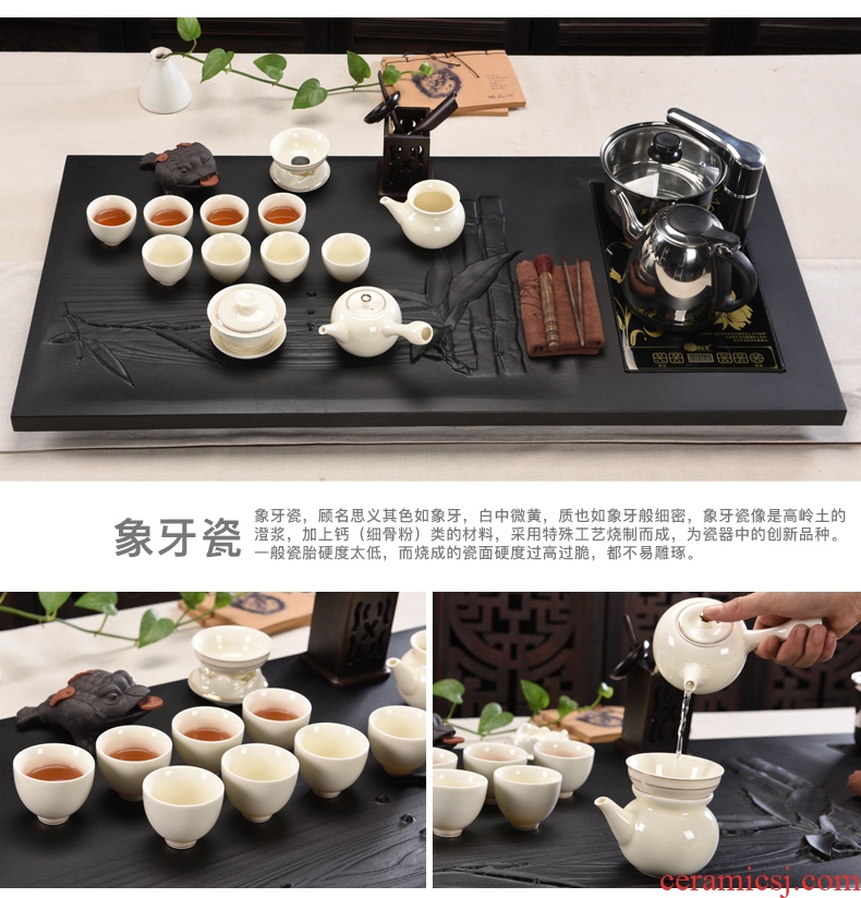 Porcelain god black stone tea suit household ceramic tea sets tea sea induction cooker sharply large stone, stone tea tray