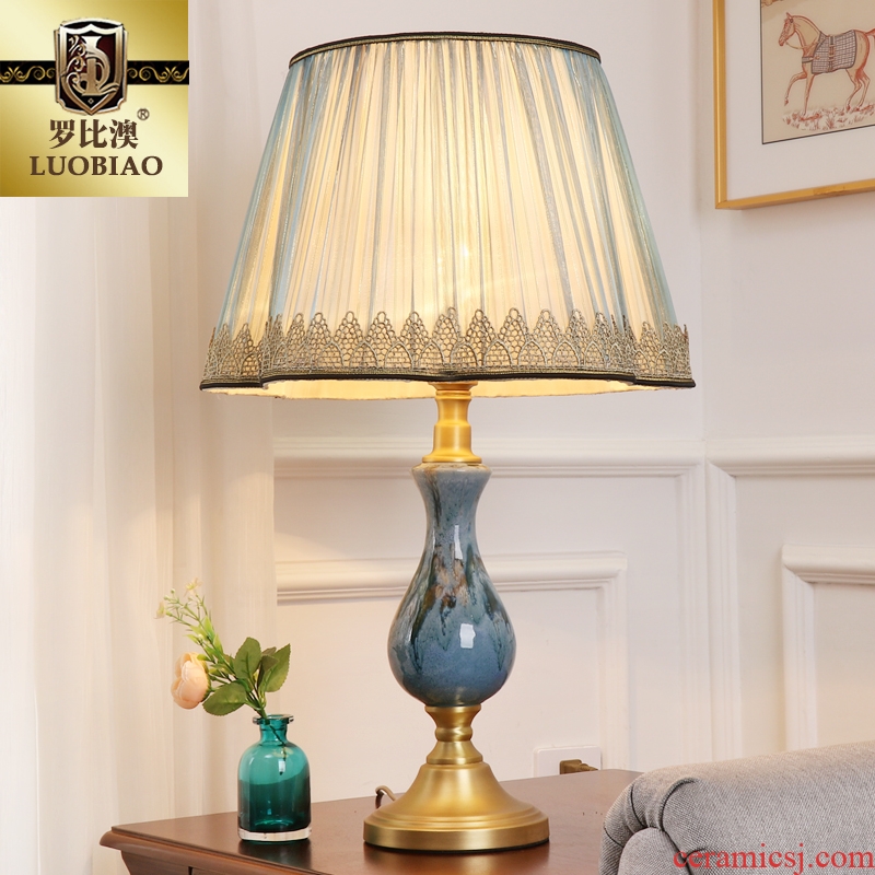 Europe type desk lamp bedroom nightstand lamp modern creative American sitting room is adjustable light sweet carried all copper ceramic lamp